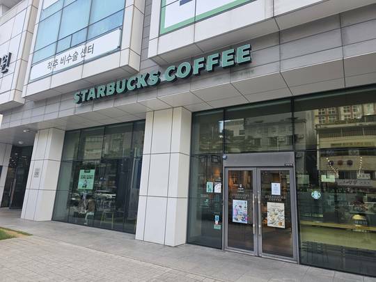 Starbucks Sindang Station Intersection — photo 1